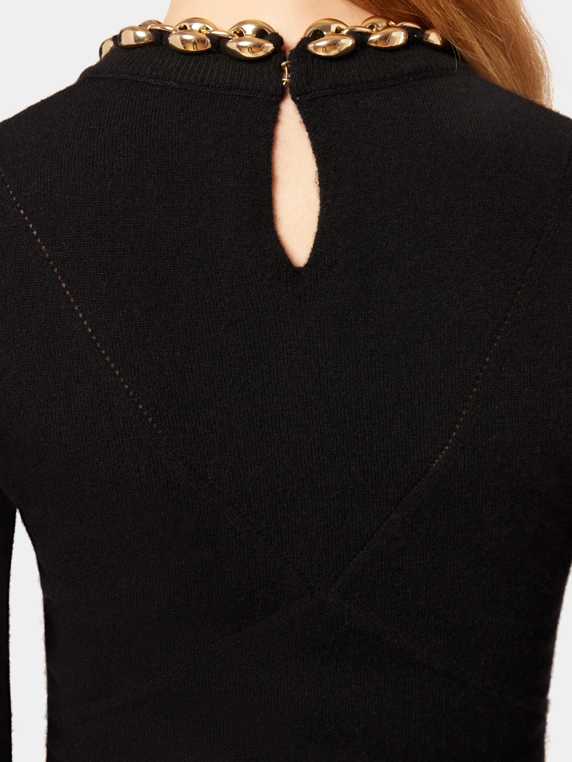 Store Pull noir en laine avec chaîne en maillons dorés Maille | Hauts
